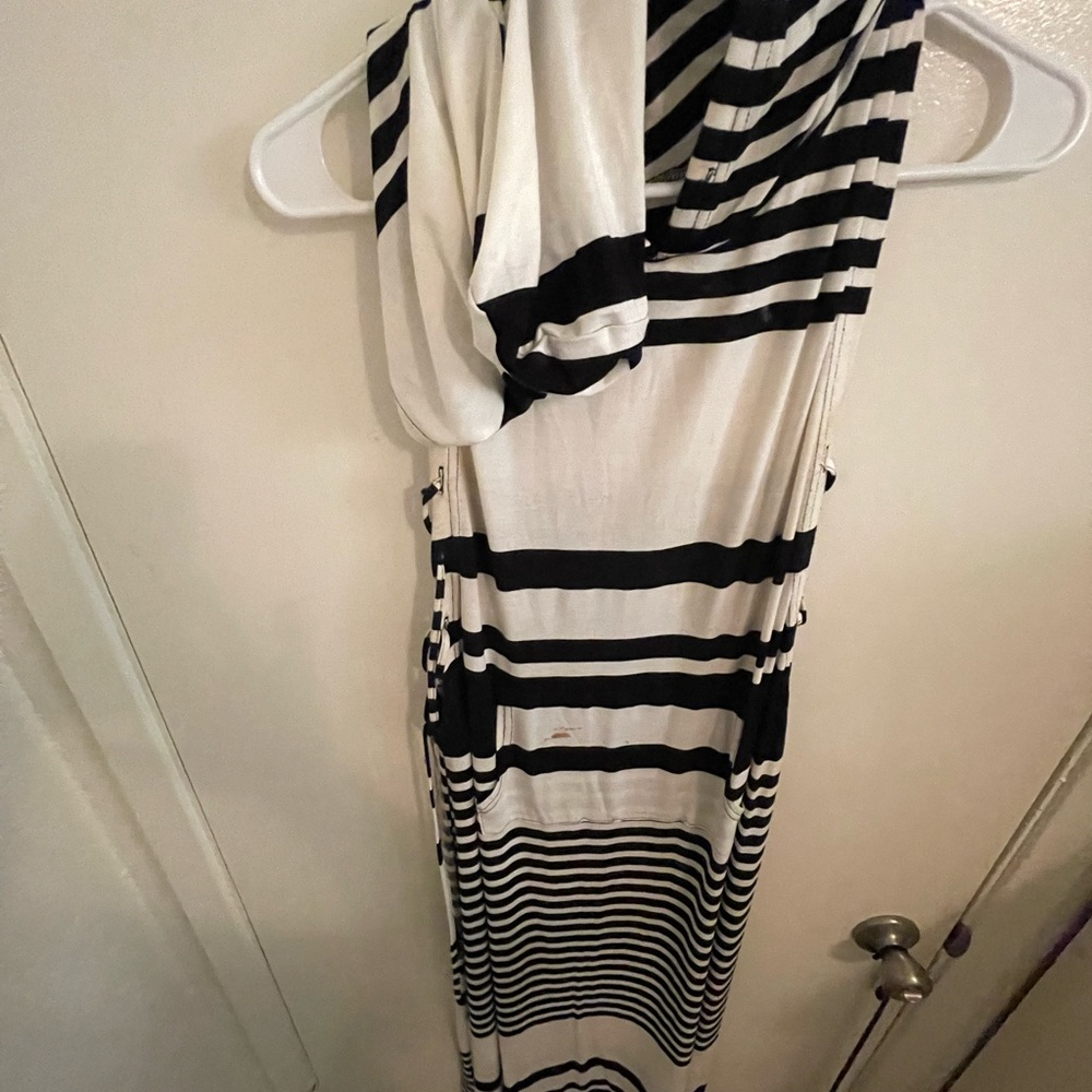 Hot and Delicious Body Con dress. Laced up sides with Hoodie.